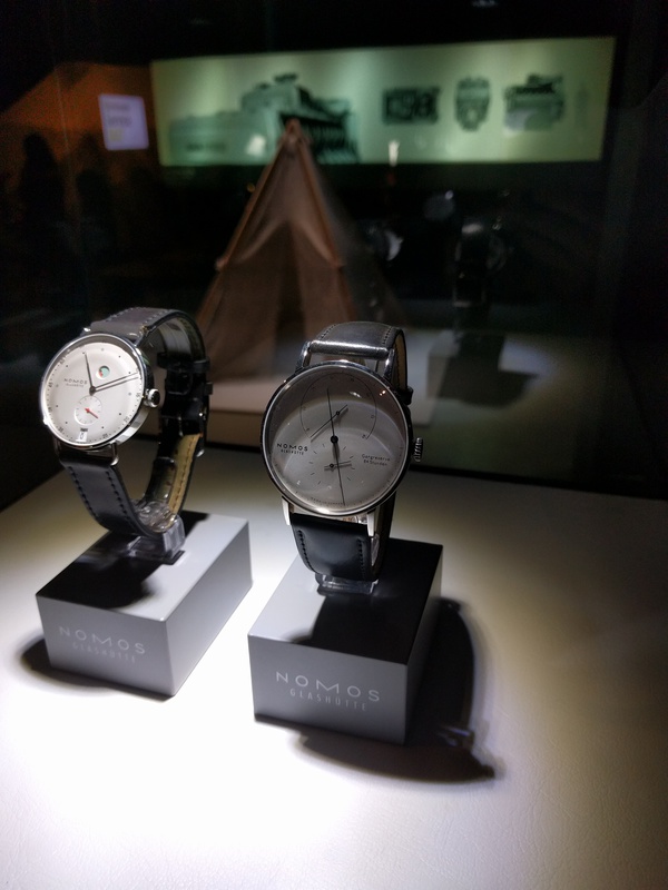 The Nomos Metro and Lambda chilling in their glass case in the Red Dot Museum